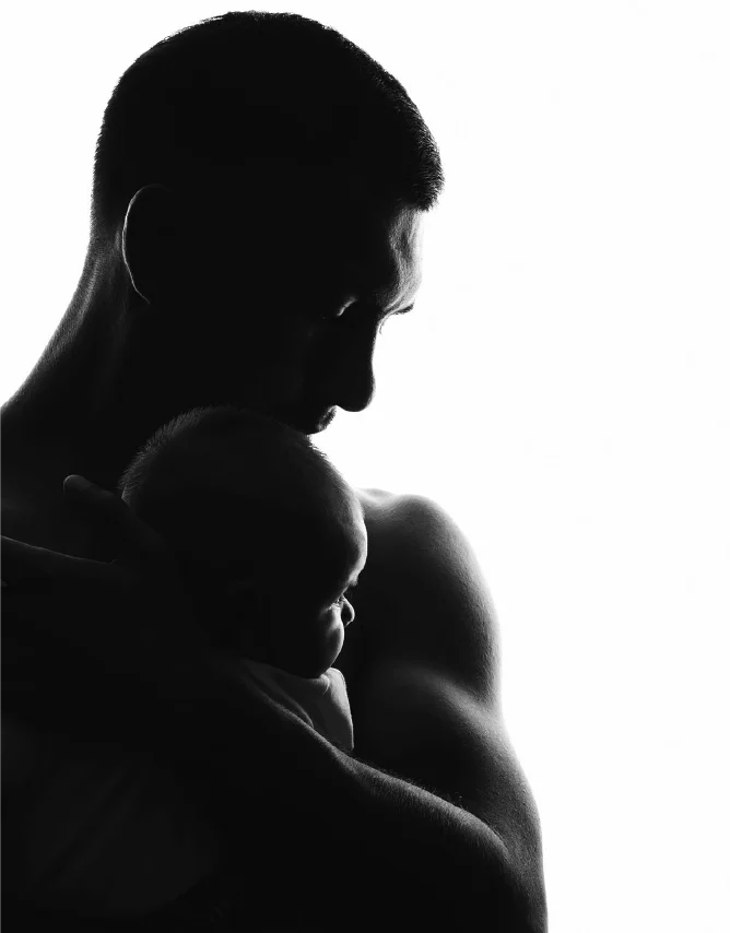 man with baby